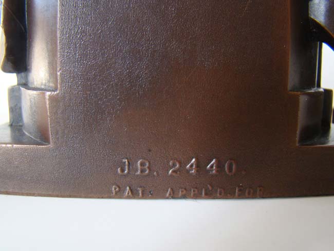 An exceptionally fine pair of Abraham Lincoln 'in the chair' bookends by Jennings Brothers of Meriden, CT, circa 1925 — image 3